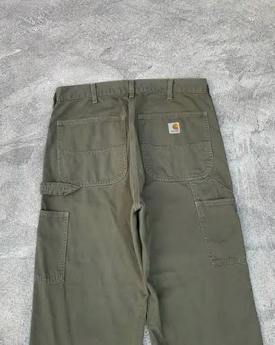 Vintage Carhartt Canvas Work Pants — Army Green — full view, broken in condition