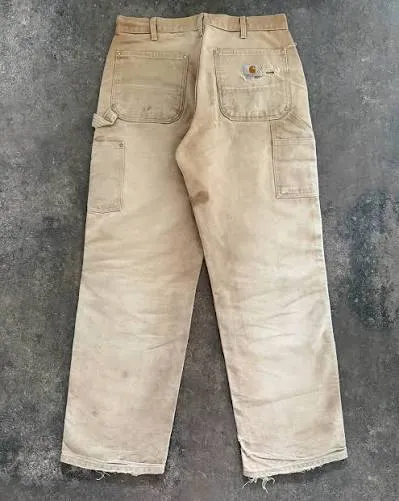 Vintage Carhartt Duck Carpenter Pants — Distressed Cream — full view, broken in condition