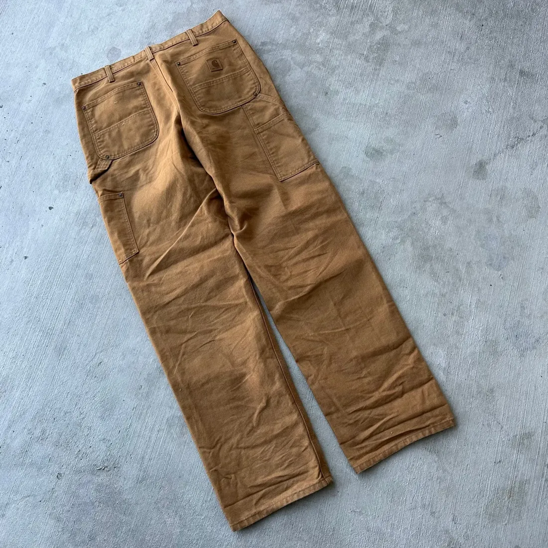 Vintage Carhartt Duck Carpenter Work Pants — Tan — full view, broken in condition