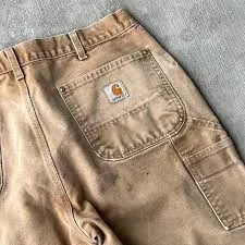 Vintage Carhartt Duck Work Pants — Sun Faded Tan — full view, slightly worn condition