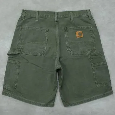 Vintage Carhartt Canvas Carpenter Shorts — Moss Green — full view, slightly worn condition