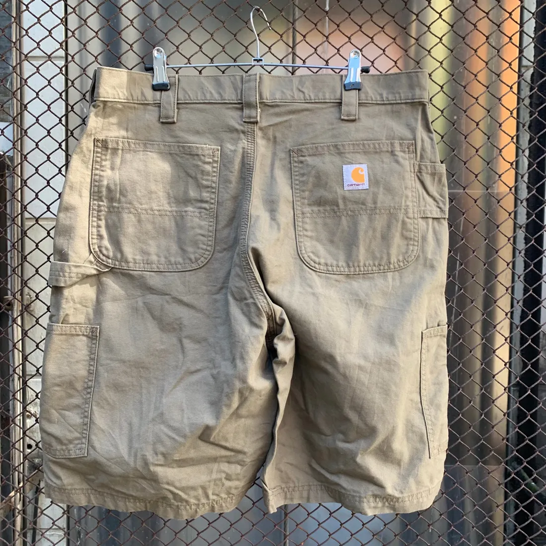 Vintage Carhartt Canvas Carpenter Work Shorts — Khaki — full view, broken in condition