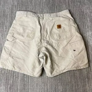 Vintage Carhartt Canvas Work Shorts — Stone Cream — full view, broken in condition