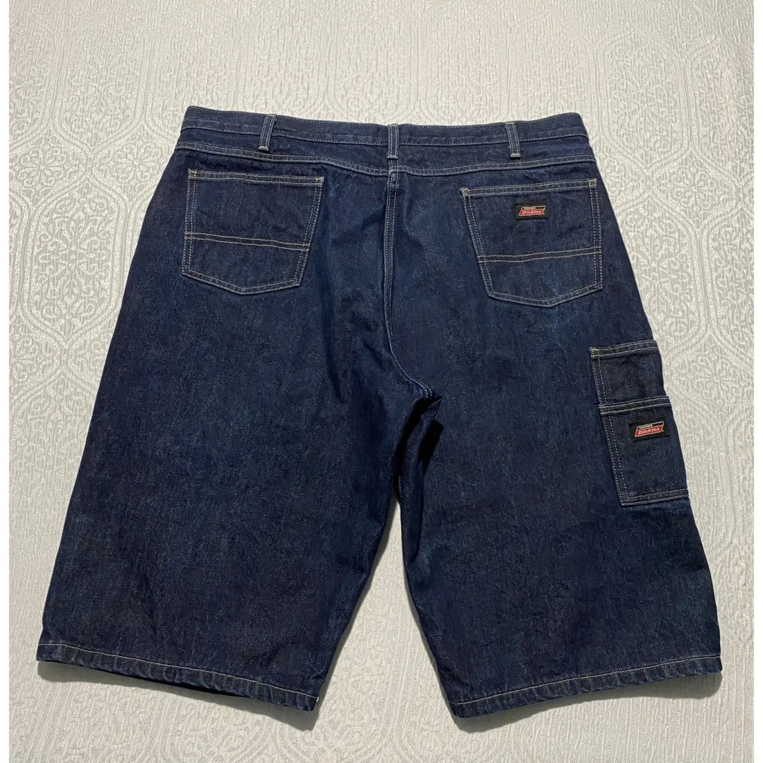 Vintage Carhartt Denim Carpenter Shorts — Dark Indigo — full view, broken in condition
