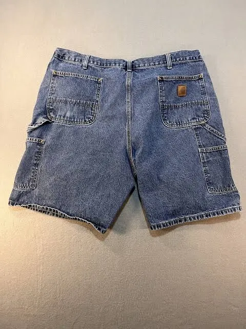 Vintage Carhartt Denim Carpenter Shorts — Stonewash Blue — full view, broken in condition